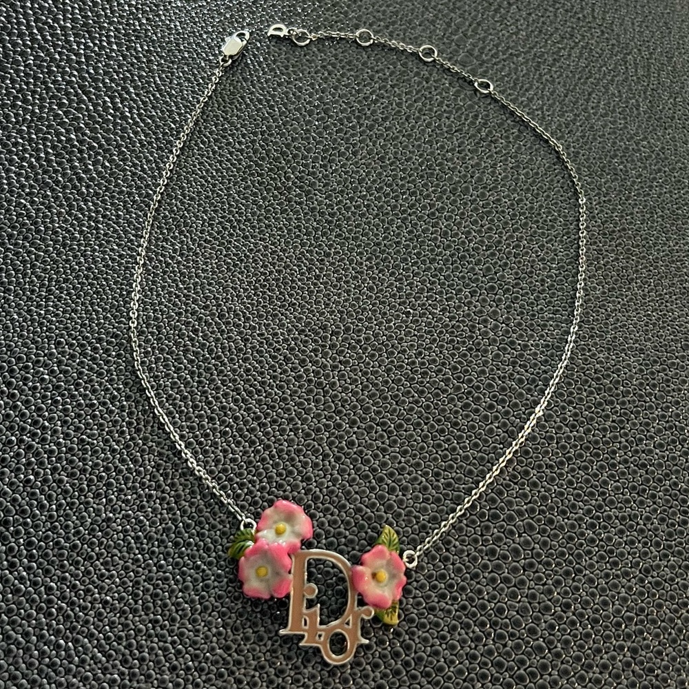 Dior silver chocker necklace. Dior letter logo with pink flowers.